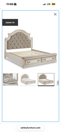 Sightly used Ashley king size bed frame with drawers l