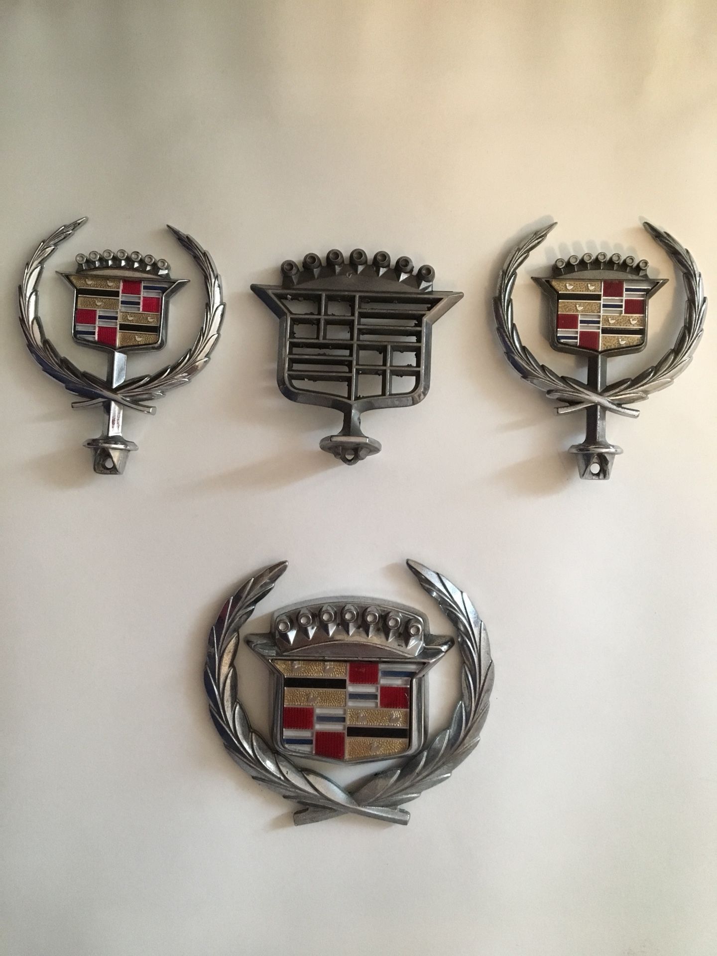 Vintage, Cadillac emblems.
