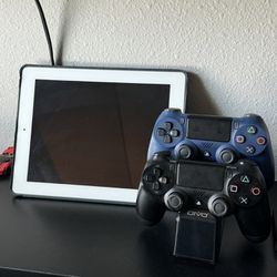 ipad and ps4 with games and 2 controllers 