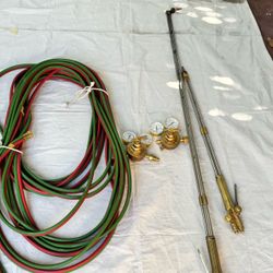 Used cutting torches 100’hose and regulators