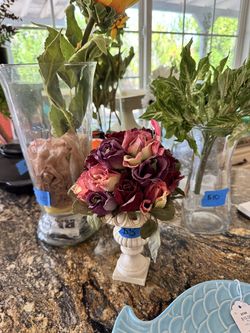 Several vases with flowers