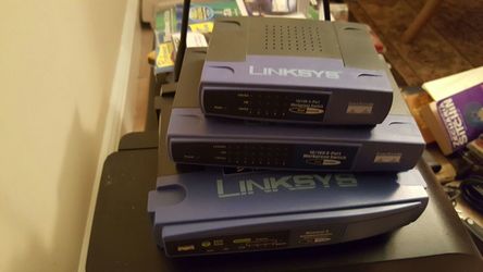 1 Linksys Broad Band 5 port Router & 1 Workgroup switch 8 port 10 / 100 & 1- 5 Port Work Group Switch