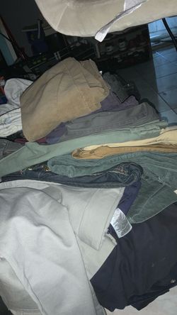 Various pair of pants, trousers, jeans, corloroid , destructed, slim fit.