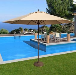 Brand new umbrella with base 11 ft