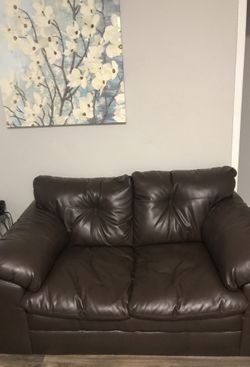 2 new leather couches