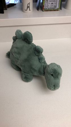 Plush dinosaur stegosaurus