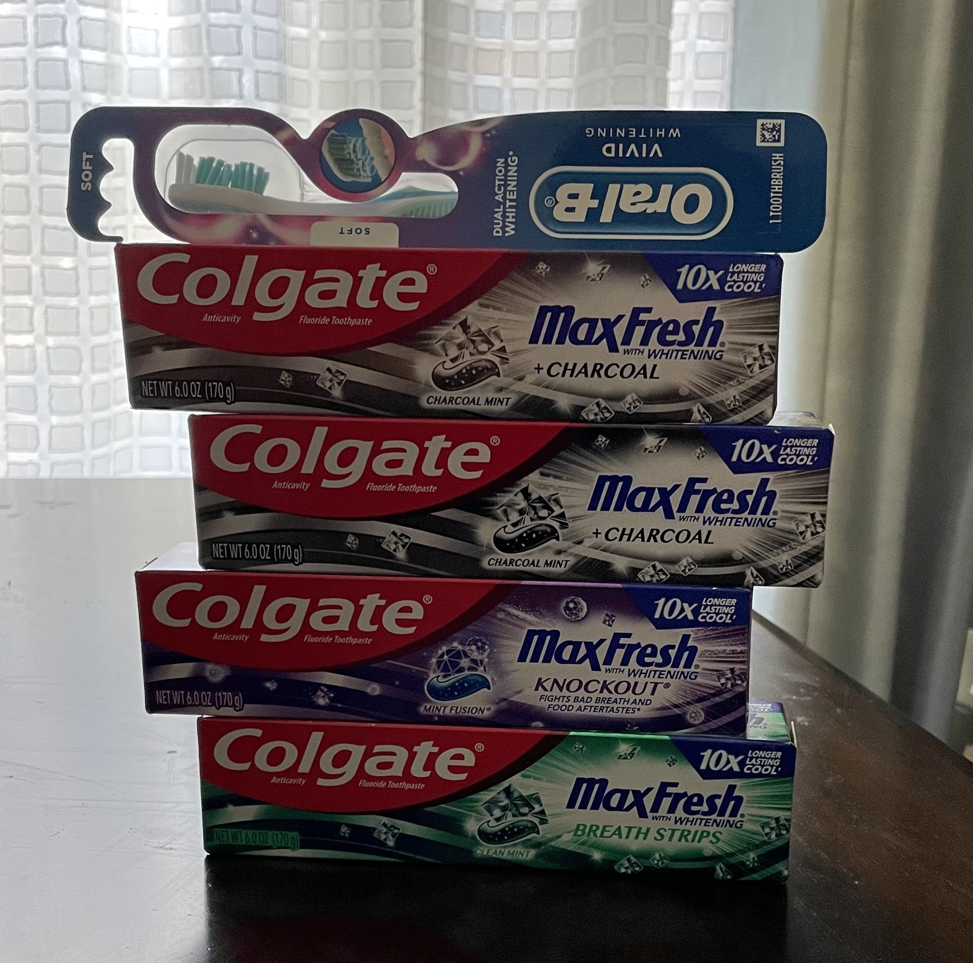 Colgate Toothpaste/ Oral-B Toothbrush