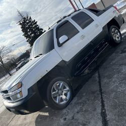 2004 Chevy avalanche and a 2000 Chevy Tahoe