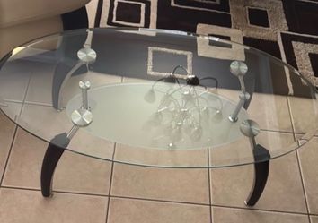 Oval Glass Coffee Table with Chrome Accents