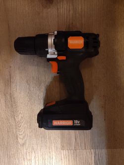 This is a Warrior 18V Cordless 3/8 in. Drill featuring a black drill with orange accents and a lithium-ion battery.
Model: This appears to be Warrior
