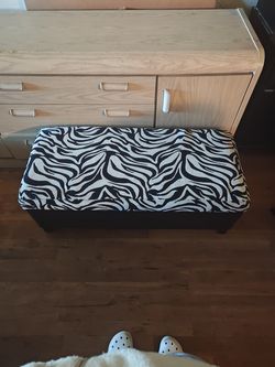 zebra-print storage ottoman bench