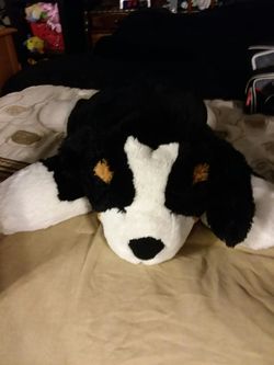 Bed top big floppy dog