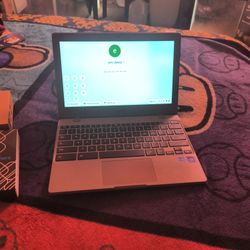 A Chromebook Laptop /And 3 Cameras