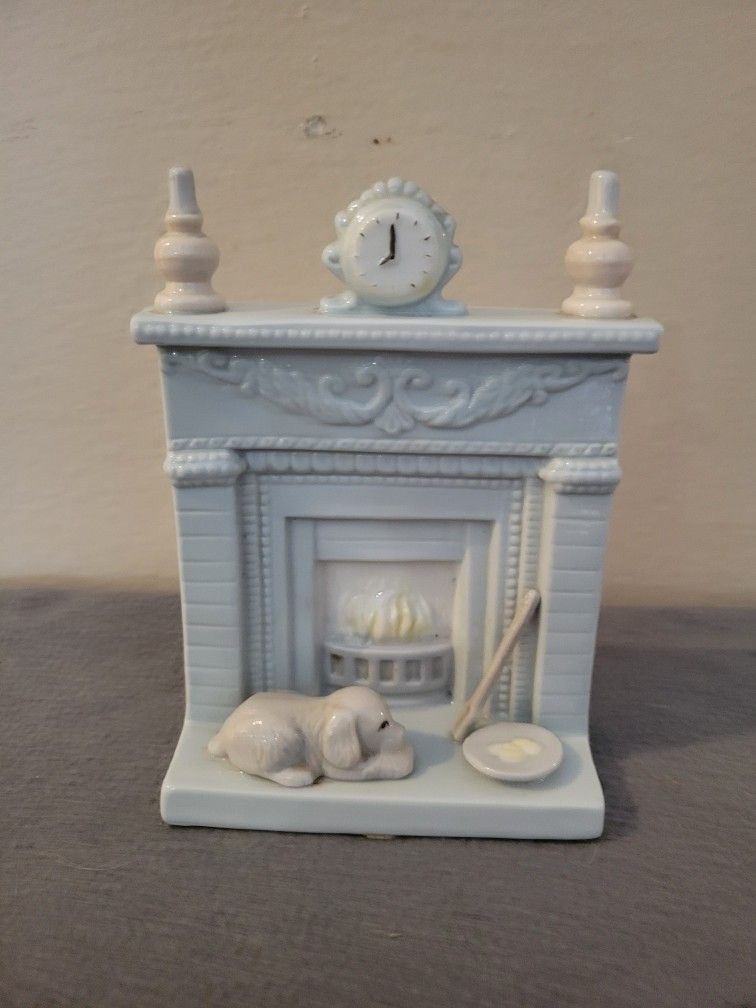 Miniature Fireplace And Puppy 