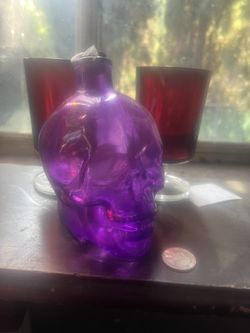 Glass Skull bottle. W/cork stopper 