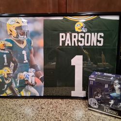MICAH PARSONS WITH THE GREEN BAY PACKERS STITCHED, FRAMED JERSEY INCLUDING ACTION FIGURE.