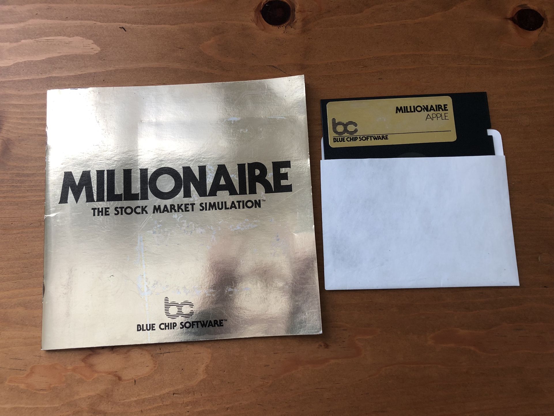 Vintage ‘MILLIONAIRE- The Stock Market Simulation’ manual plus disk for Apple by Blue Chip Software
