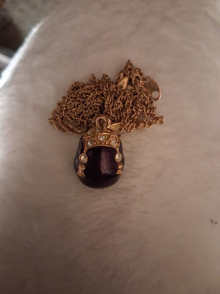 Avon Purple Egg Pendant