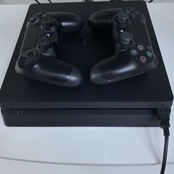 PS4 w 2 Controllers And Games