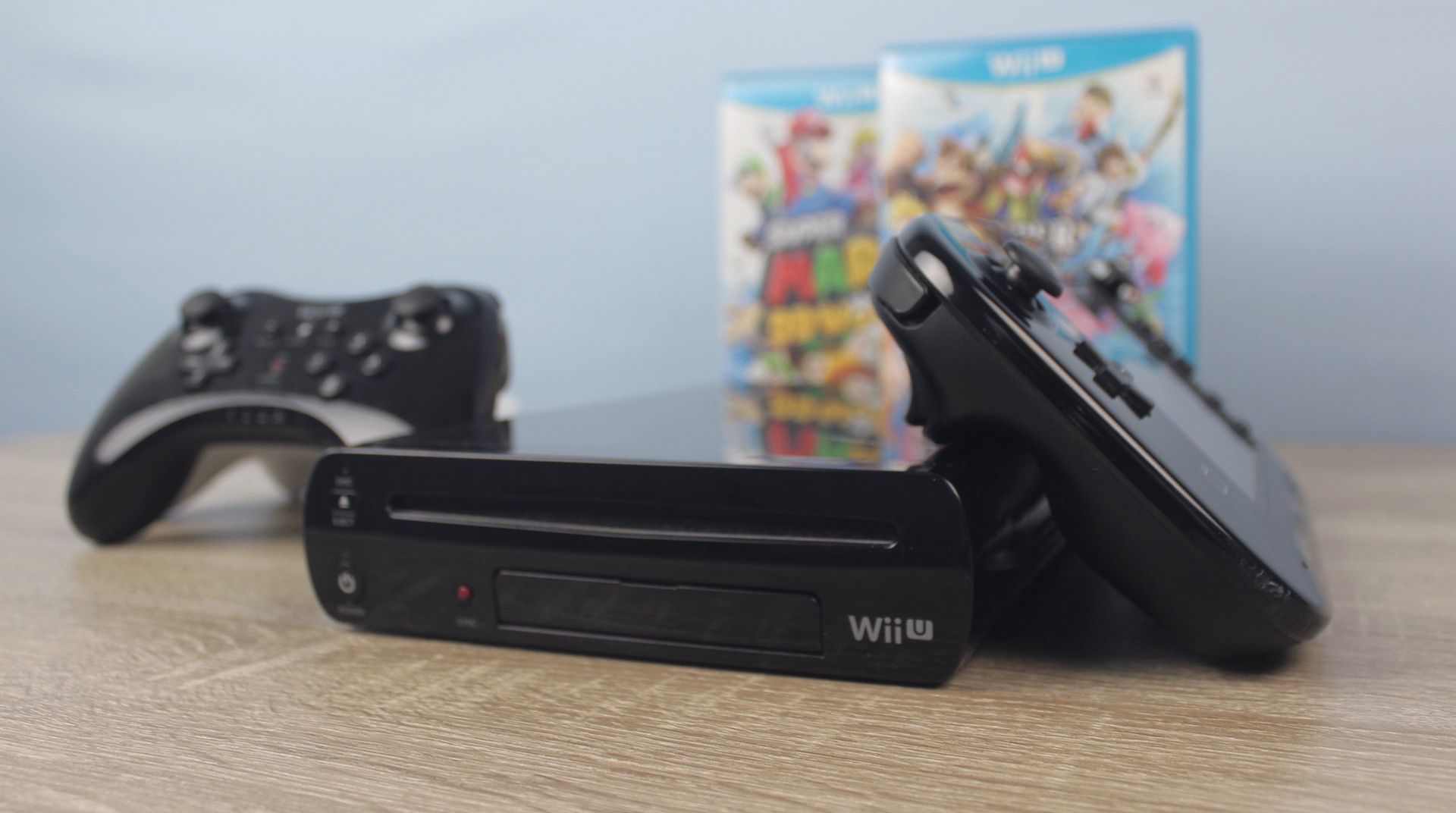 Nintendo Wii U Black with Gamepad, Super Smash Bros, Super Mario 3D World, 2 Pro Controllers, and More!
