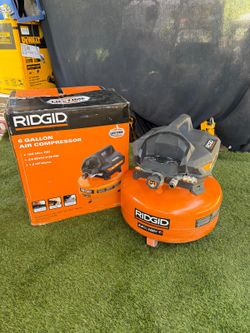 RIDGID
6 Gal. 150 PSI Portable Electric Oil-Free Jobsite Pancake Air Compressor with Dual Pressure Gauges and 2-Quick Couplers