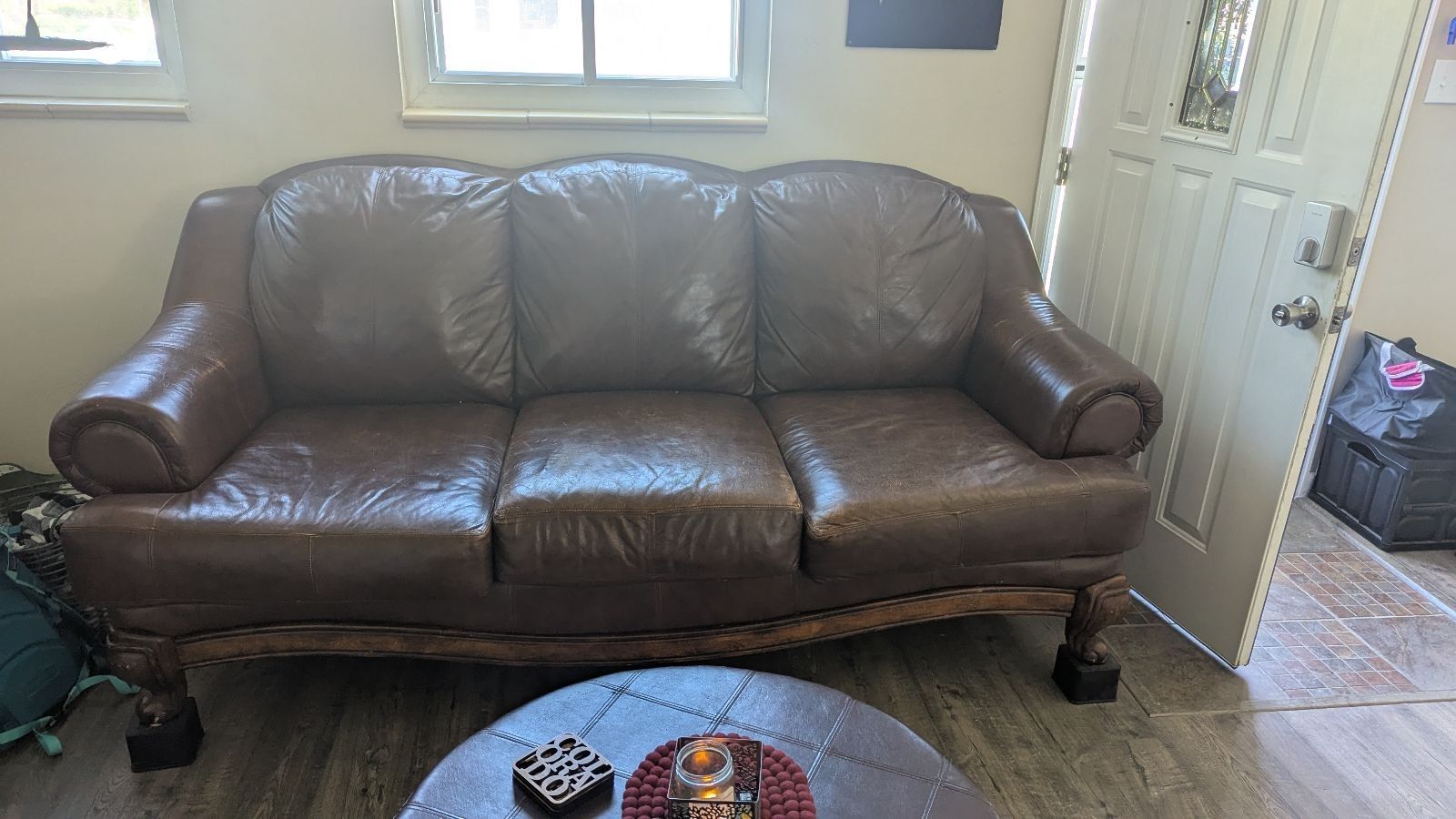 Nice Leather Couches With Wood Accents and Ottoman