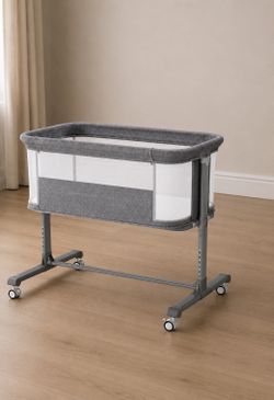 Bassinet with wheels that lock