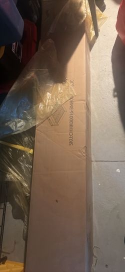 Brand new in box king sized bed frame with storage