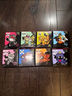 McDonald's Hello Kitty and Friends Godzilla. Complete set