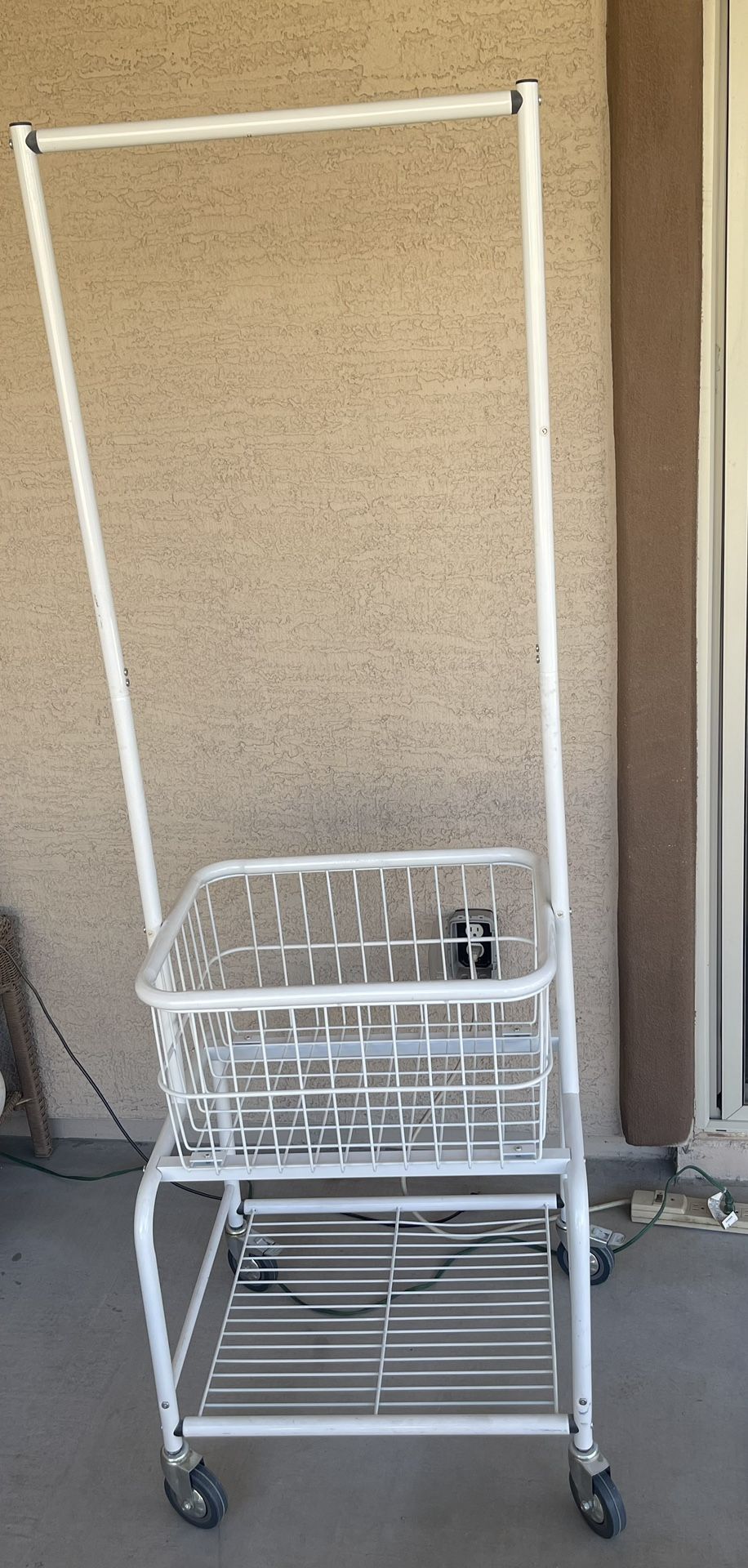 Rolling laundry cart with hanging bar and basket