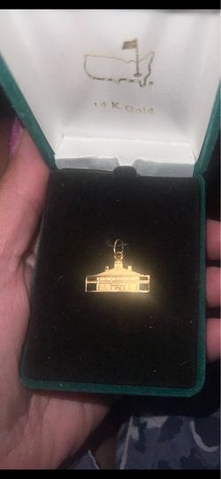 Gold masters charm