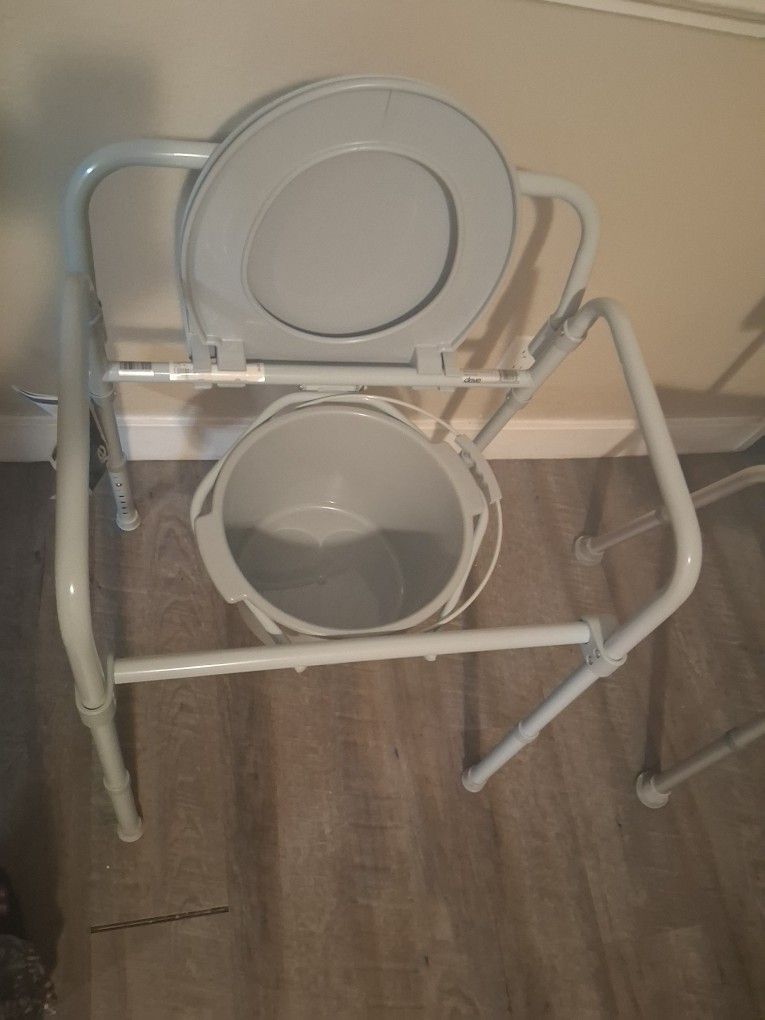 3 In 1 Toilet Commode and a shower chair