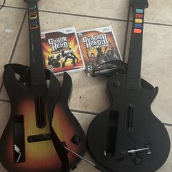 Wii Guitar Hero Controllers + GH: World Tour And GH3 Games