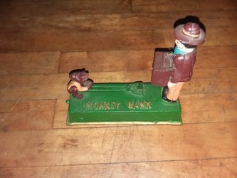 Cast iron mechanical bank