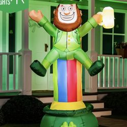 St. Patrick’s Day yard inflatable leprechaun with beer pot of gold rainbow used. Great condition tested