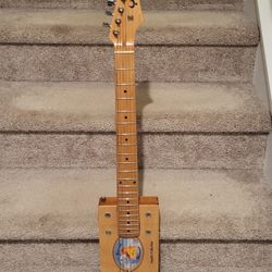 Not Your Father's Cigar Box Guitar- Old School Sound Meets Modern Playability