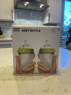 2 brand new como tomo bottles