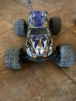 Traxxas Revo And Red Cat Volcano