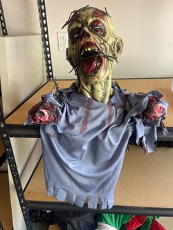 Halloween decorations scary torso human skull head monster zombie