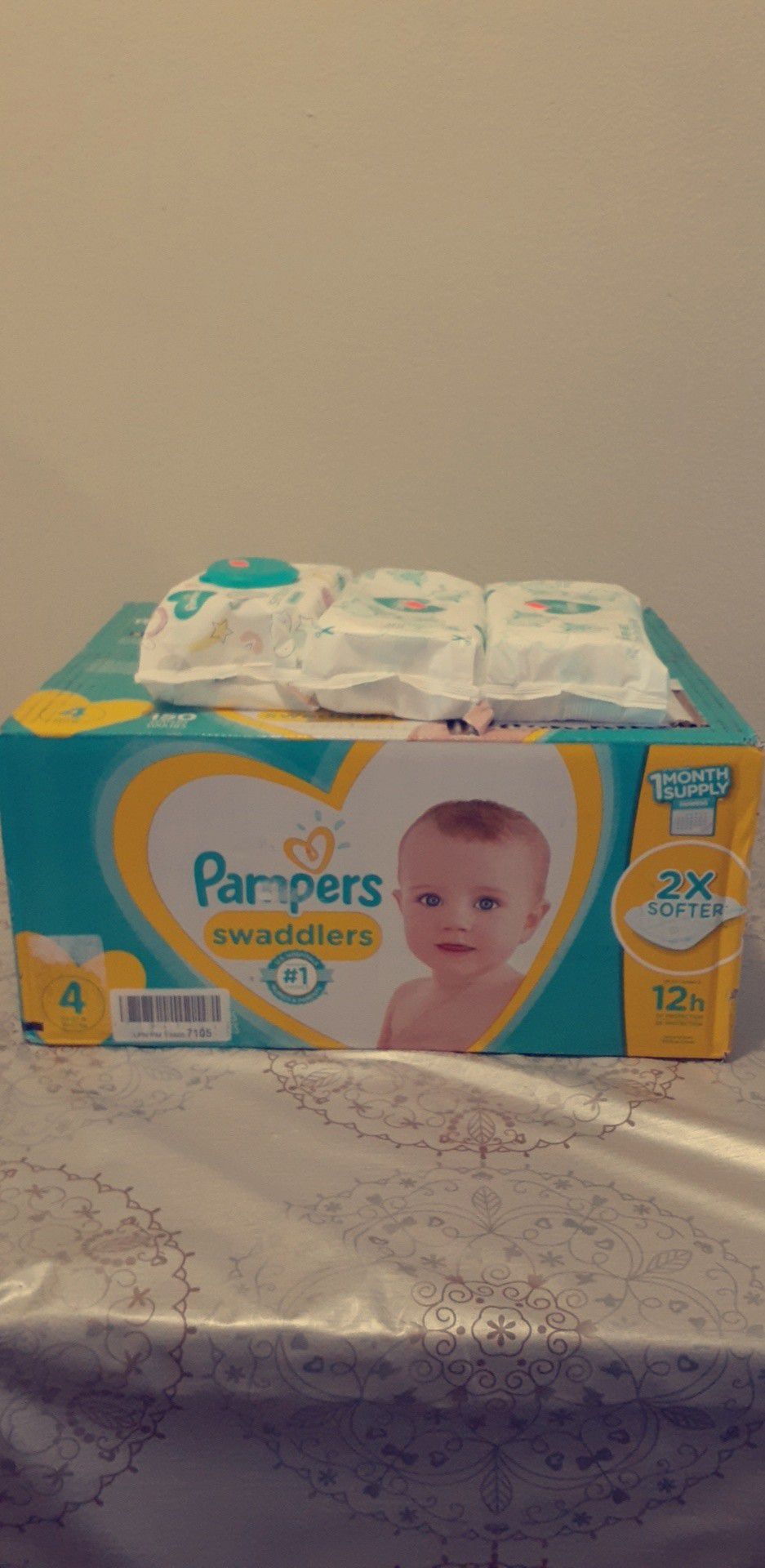 Huge brand new Baby diapers size 4 and 3 packs of Pampers wipes