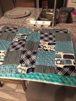 But and new thick home made infant quilt