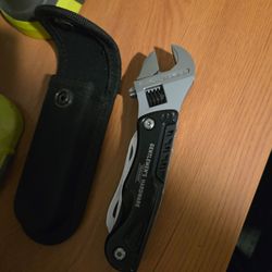 Unique multi-tool survival tool with a adjustable wrench knife Phillips and Flathead screwdriver