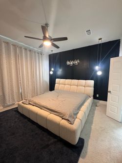 Calforinia king bed (ashley) + extra firm mattress ( serta)