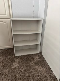 Three shelve bookcases