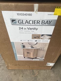 Glacier Bay Cranwood 25 in. Single Sink Freestanding Sandstone Bathroom Vanity with White Cultured Marble Top (Assembled)
