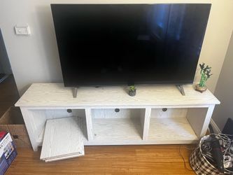tv stand and couch