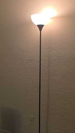 3 lamps with bulbs one of the bulbs is smart