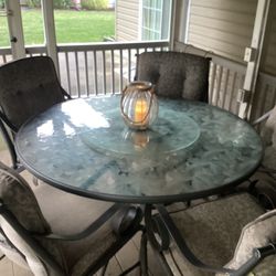 6 Peice Etched Glass Lazy Susan Neutral Thick Cushion Wrought Iron Chair Patio Set