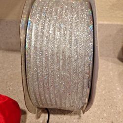 Beaut.\nIful silver with lines , and it's got wire