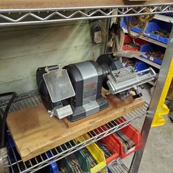 Vintage Craftsman bench grinder with heavy duty mechanical sharpening guide